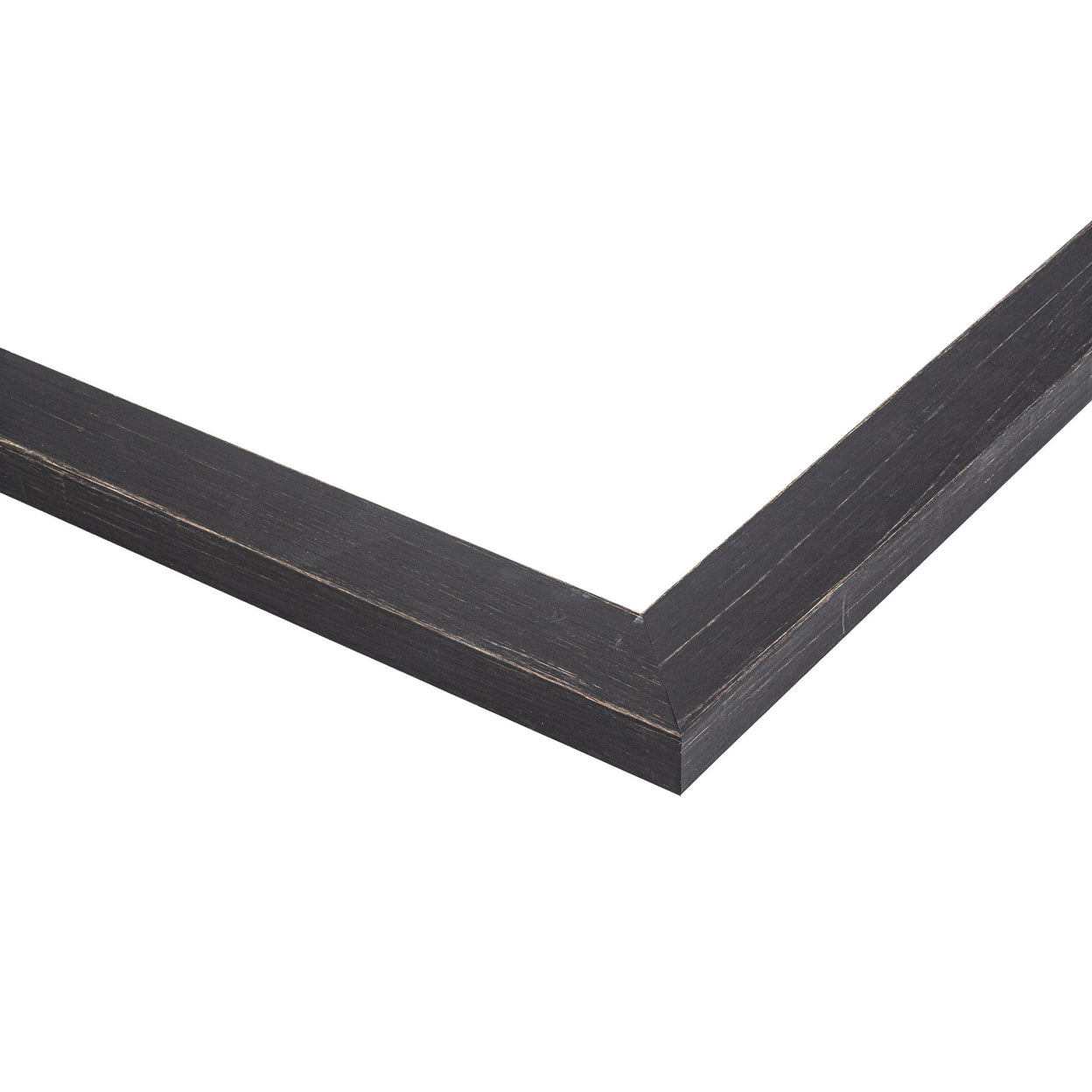 Close-up of a rustic black artist frame showing the distressed matte black finish and the subtle warmth of the natural wood substrate.
